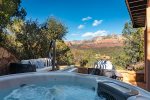 Relax admist the Red Rocks in the private luxurious hot tub on the lower patio